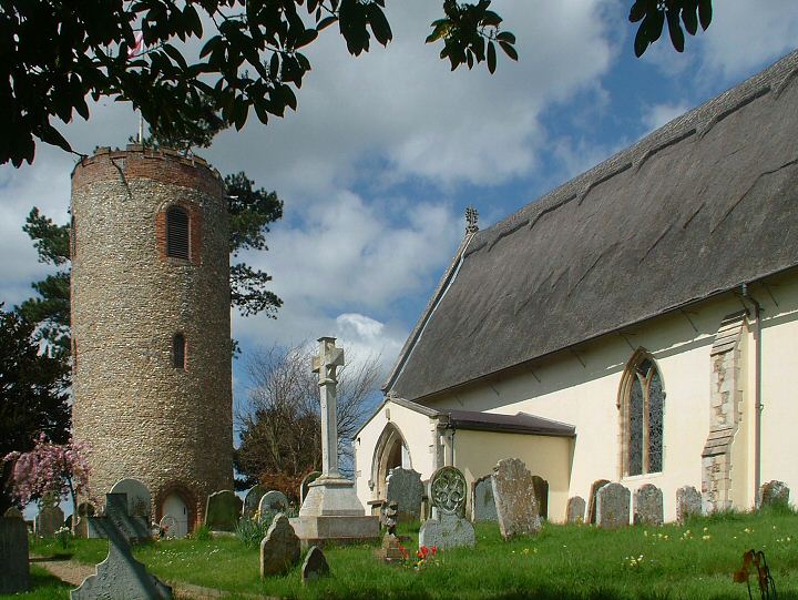 Bramfield's church of St.Andrew with its distinctive and unique freestanding round tower from which the previous photographs were taken. There is no evidence that any other building has ever been attached to the tower. The tower measures 43'6"/14 metres high with correspondingly thick walls wherein are housed five bells of varying dates from 1440.  Round tower churches are a feature of East Anglia with 42 in Suffolk, several of which are within a few miles of Bramfield. The main church of St.Andrew's is a beautiful building inside and out with notable memorial sculpture, interesting memorial inscriptions and a fine early 16th century timber screen which still features colour decoration. 