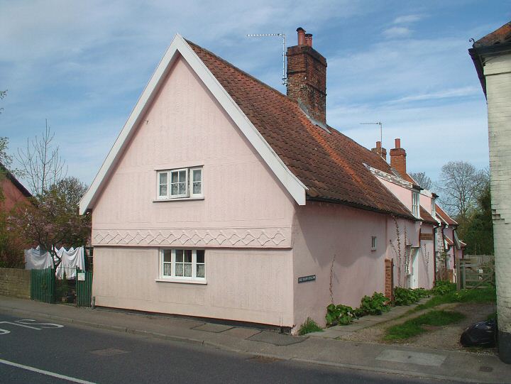 An old house in the main street with an interesting roof angle , characteristic chimney and pargetting (decorated plasterwork) . This property may well have originally had a thatched roof but is now pantiled. 